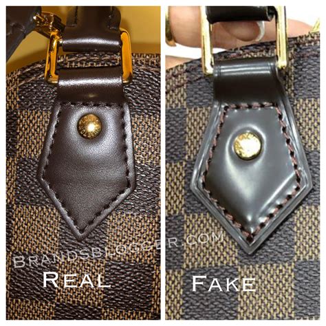 how to spot a fake louis vuitton alma handbag|louis vuitton alma bag authentication.